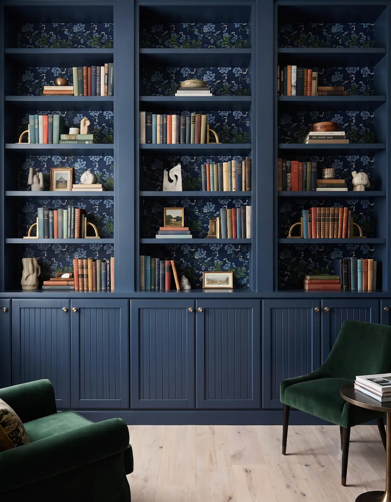 AI-generated room concept with navy bookshelves above a pale wood-look floor