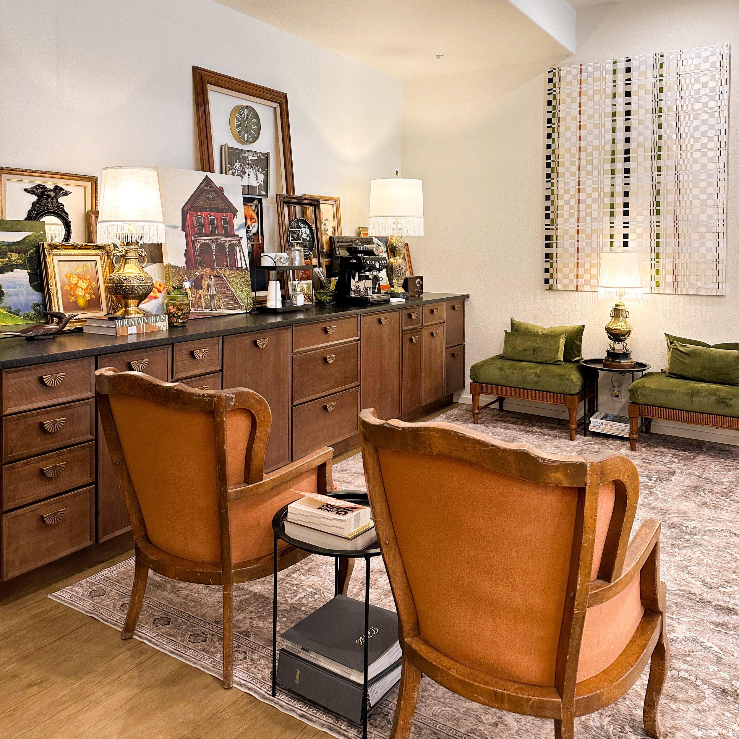 Consultation table and seating surrounded by showroom displays
